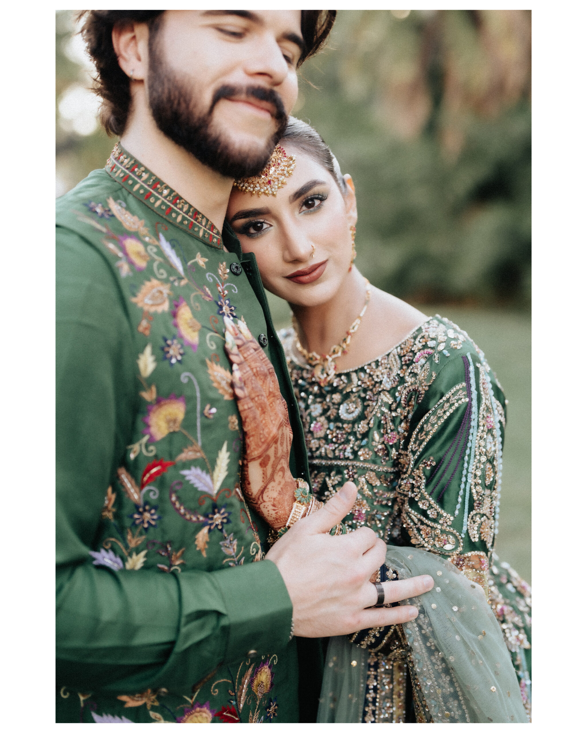 Indian Wedding Photographer in Tampa 4 South Asian wedding photographer Tampa: couple portrait in green outfits at their mehndi