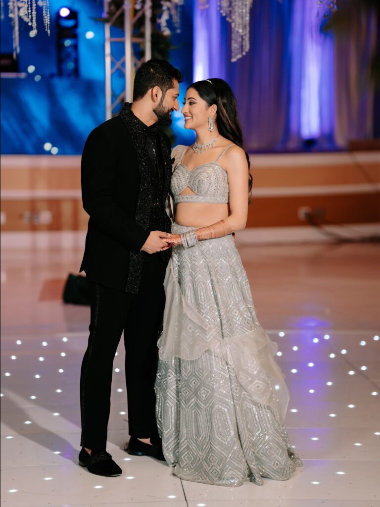 Priya & Dillan’s Gujarati Wedding | Indian Wedding Photographer Atlanta 22 Couple in silver and black on the dance floor at their Indian wedding reception, Atlanta couple photographed by Noor K Photography