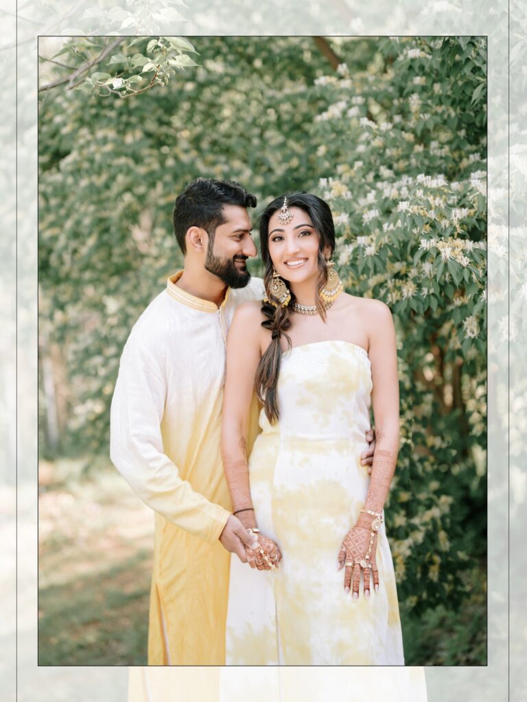 Priya & Dillan’s Gujarati Wedding | Indian Wedding Photographer Atlanta 6 Couple in yellow and white ombre outfits posing among trees at a pre-wedding event in Atlanta