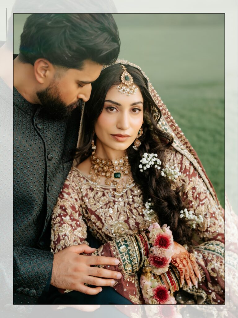 Amen & Shoaib’s Stunning South Asian Wedding at Signia by Hilton & Waldorf Astoria Orlando 3 Groom in a grey sherwani holding the bride close at their mehndi, South Asian wedding photography in Orlando