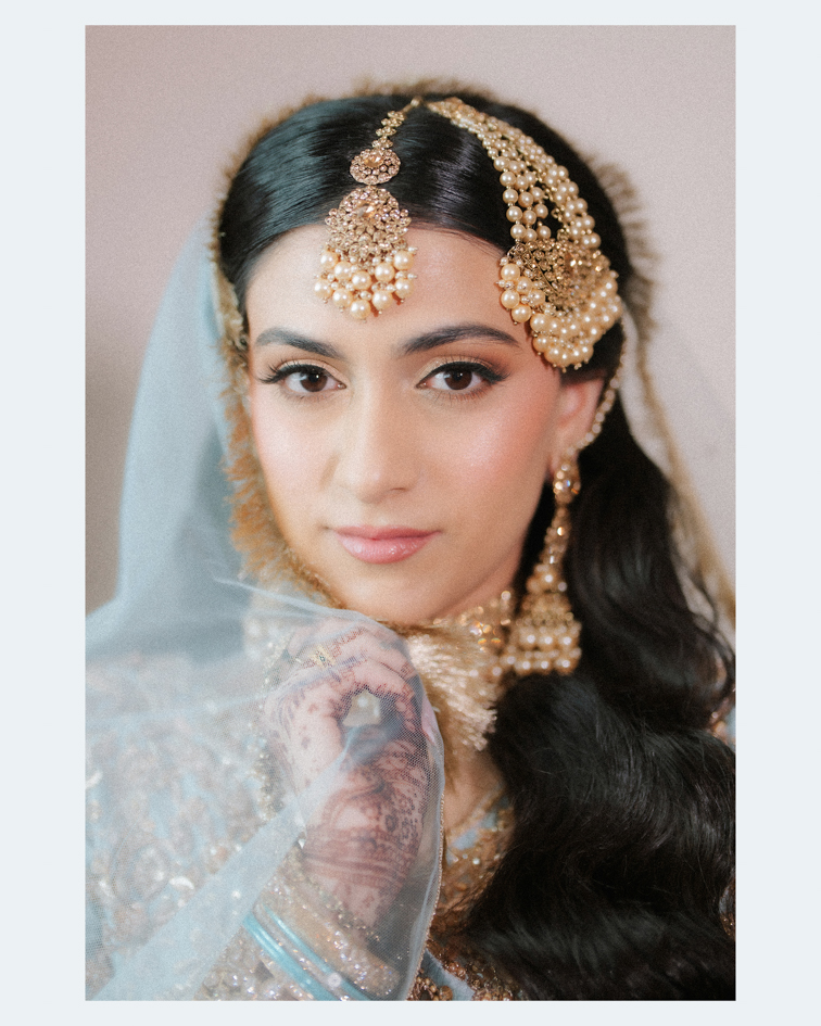 Hanna & Nabeel’s Stunning Nikkah at Hilton Tampa Downtown 3 Bridal portrait of Hanna with a pearl jhoomar and maang tikka, Hilton Tampa Downtown nikkah